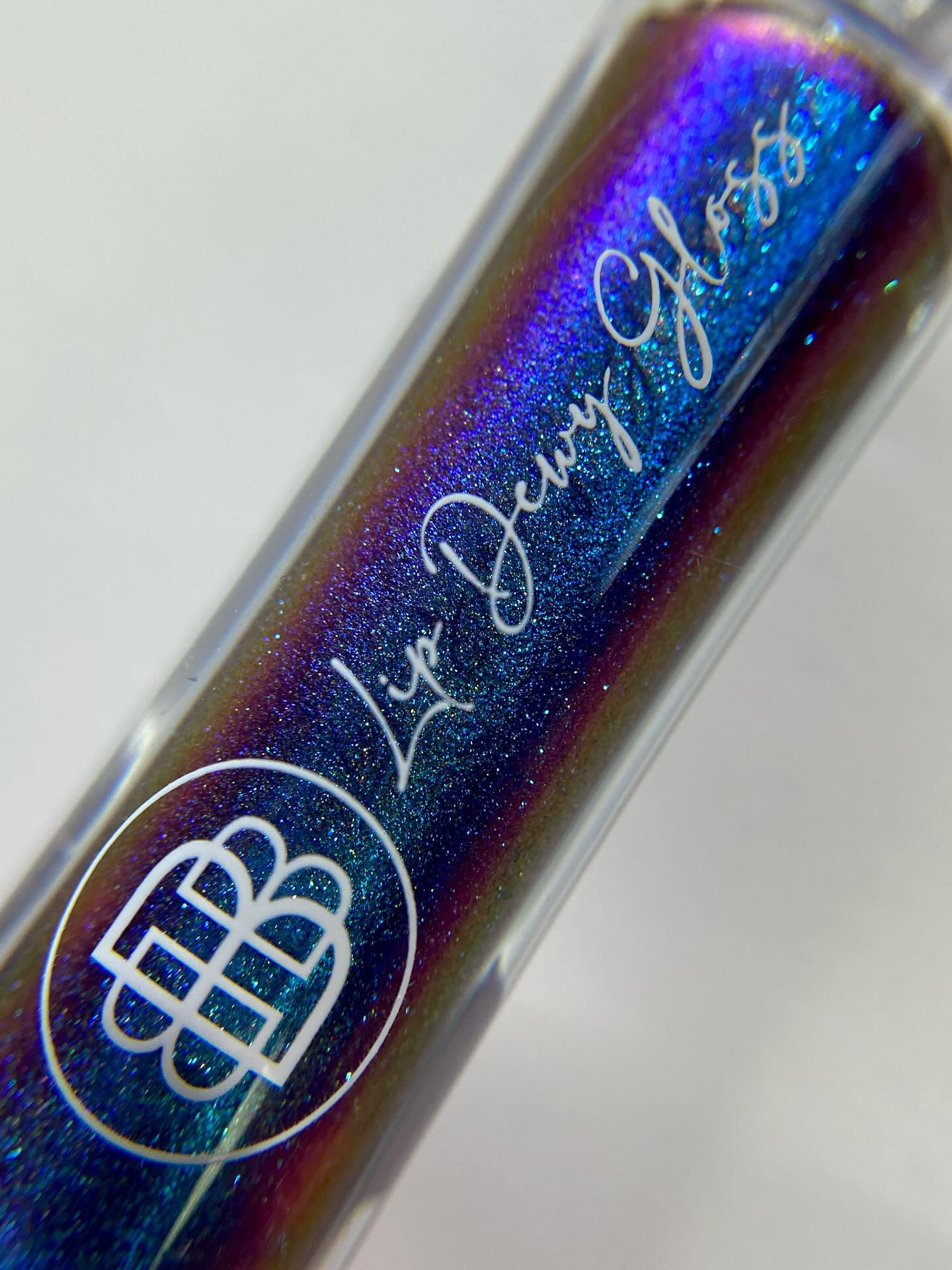 Multi-Chrome Lip Dewy Gloss- Raisin the Bar x Deandranicoleee